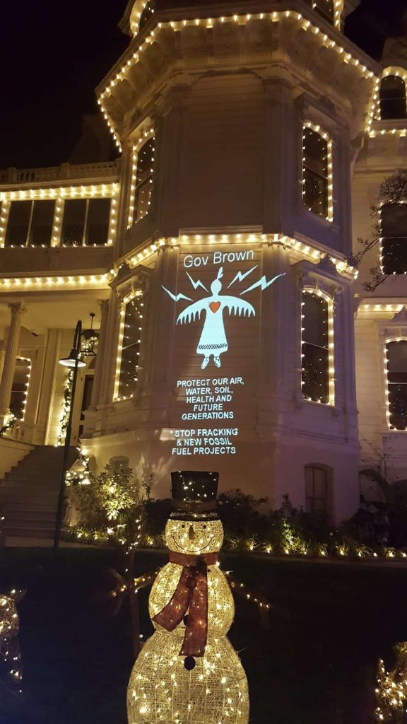Carolers Condemn Brown for Climate Cowardice